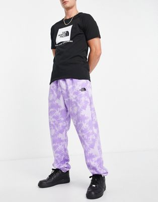 The North Face Oversized Essential joggers in purple tie dye Exclusive at ASOS