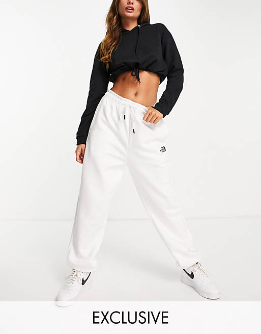 The North Face Oversized Essential joggers in white Exclusive at ASOS