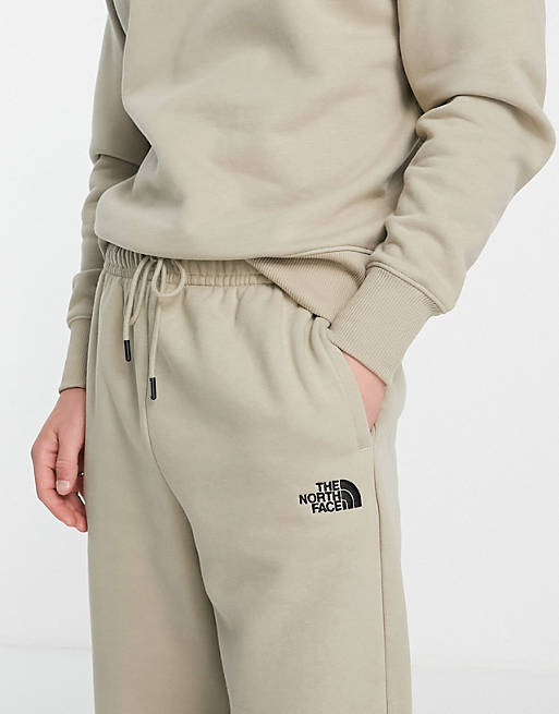 The North Face Oversized Essential sweatpants in beige Exclusive at ASOS