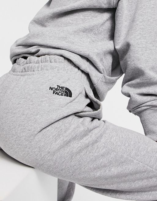 The North Face Essentials sweatpants in light gray - Exclusive at ASOS