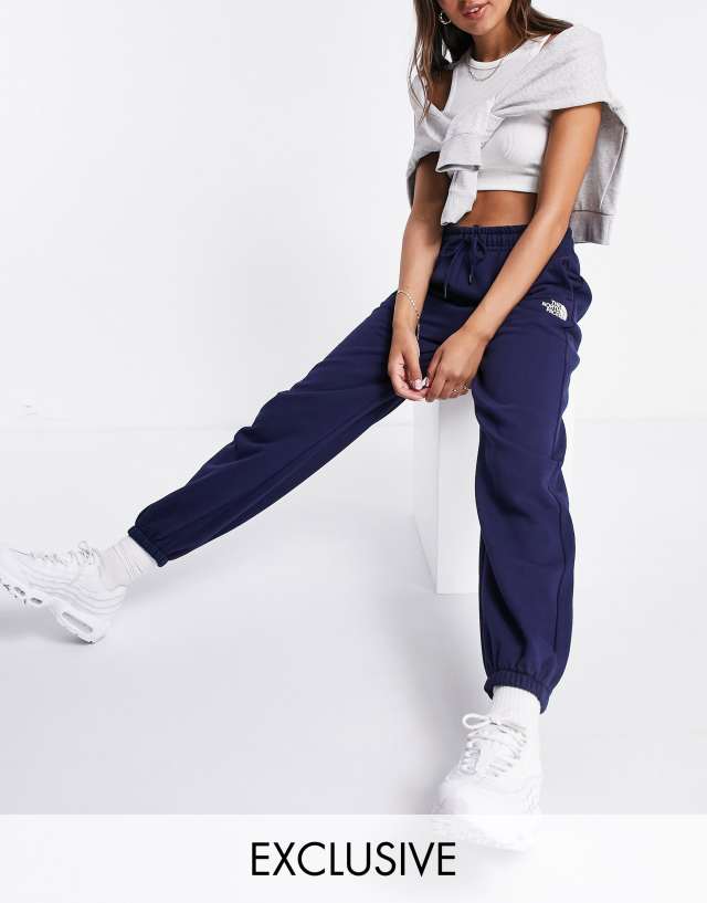 The North Face Oversized Essential sweatpants in navy Exclusive at ASOS