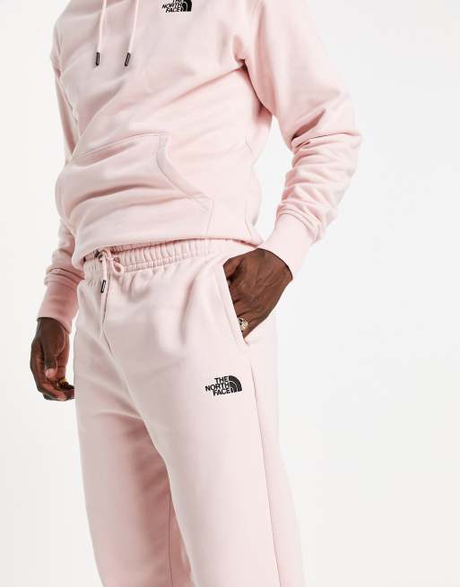 The North Face Oversized Essential sweatpants in pink Exclusive to ASOS