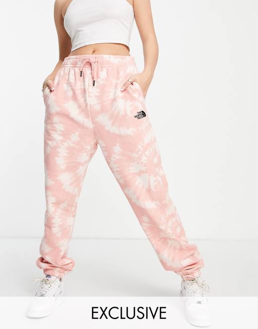 The North Face Oversized Essential sweatpants in pink tie dye Exclusive at ASOS