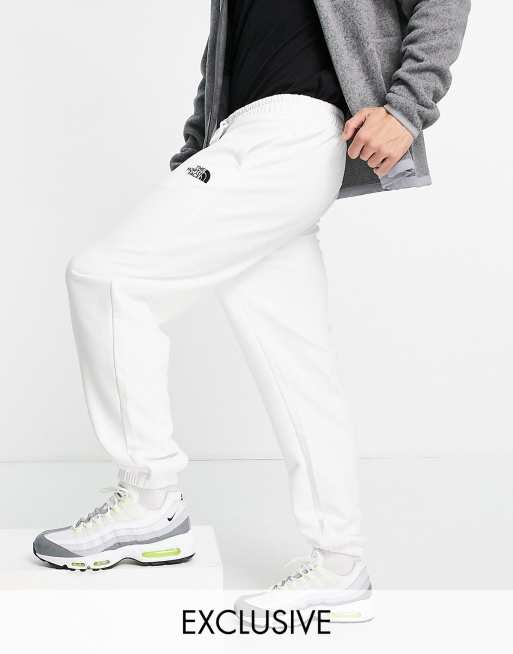The North Face Oversized Essential trackies in white Exclusive at ASOS