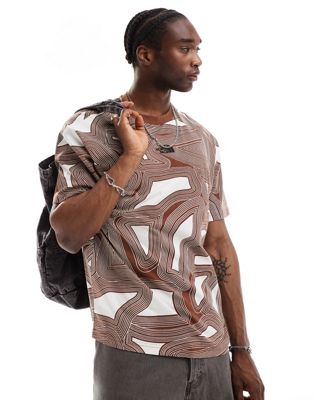 The North Face Oversized heavyweight t-shirt in brown geo print Exclusive at ASOS