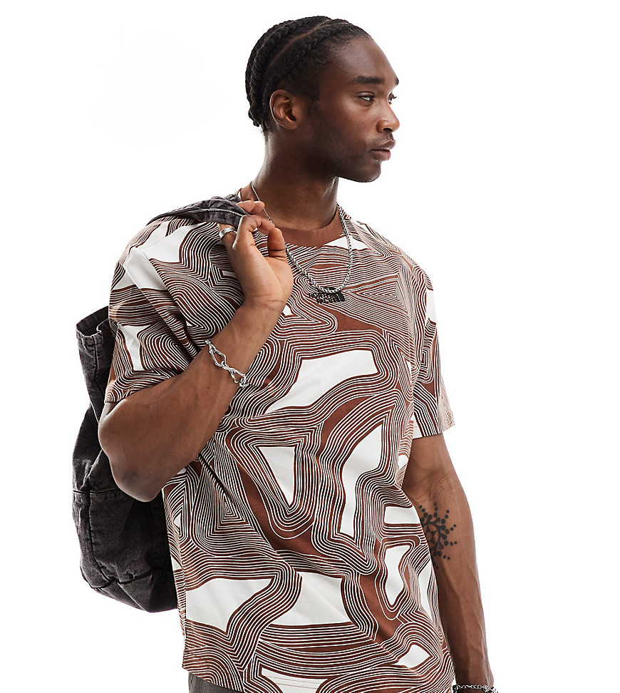 The North Face Oversized heavyweight t-shirt in brown geo print Exclusive at ASOS