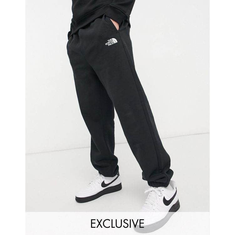 The North Face Oversized sweatpants in black Exclusive at ASOS