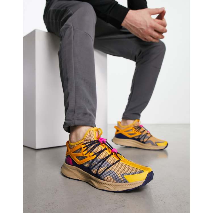 The North Face – Oxeye Tech Mid – Wander-Sneaker in Gelb und Stone