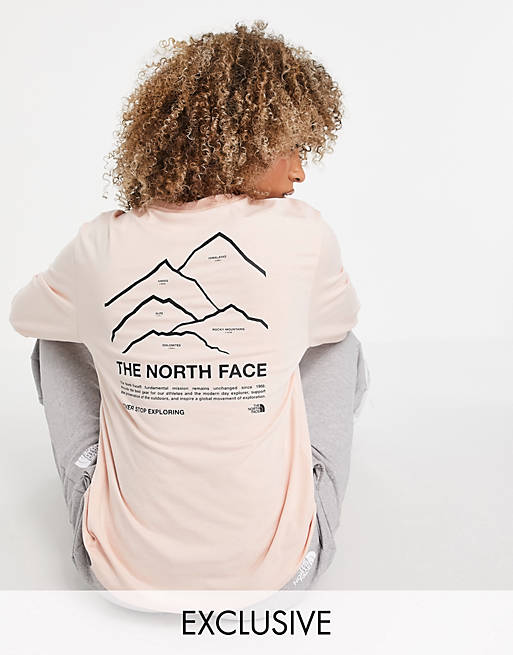 The North Face Peaks long sleeve t-shirt in pink Exclusive at ASOS