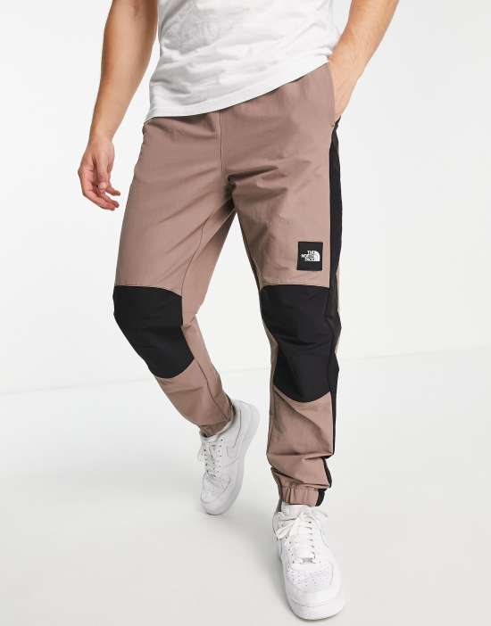 https://images.asos-media.com/products/the-north-face-phlego-dryvent-woven-track-sweatpants-in-taupe/203204264-1-brown?$n_550w$&wid=550&fit=constrain