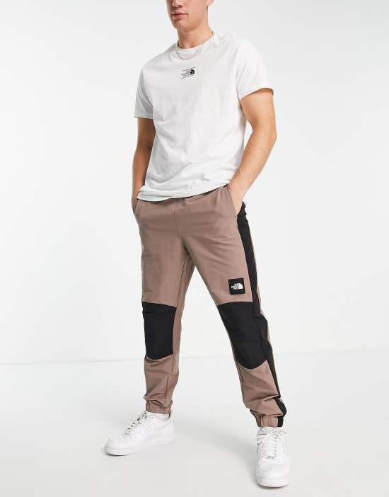 https://images.asos-media.com/products/the-north-face-phlego-dryvent-woven-track-sweatpants-in-taupe/203204264-4?$n_550w$&wid=550&fit=constrain