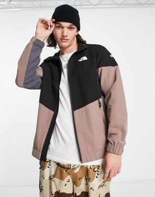 The North Face Phlego DryVent zip up track jacket in black and taupe
