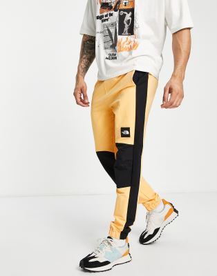 north face yellow pants