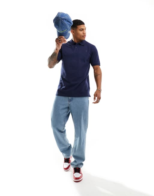 The North Face – Pikee-Polohemd in Marineblau mit farblich abgestimmtem Logo