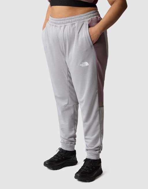 The North Face Plus mountain athletics fleece pant in meld grey/fawn grey