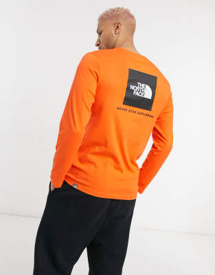 orange north face long sleeve