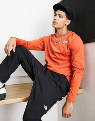 orange north face long sleeve