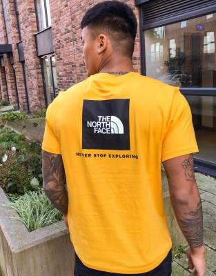 yellow north face t shirt