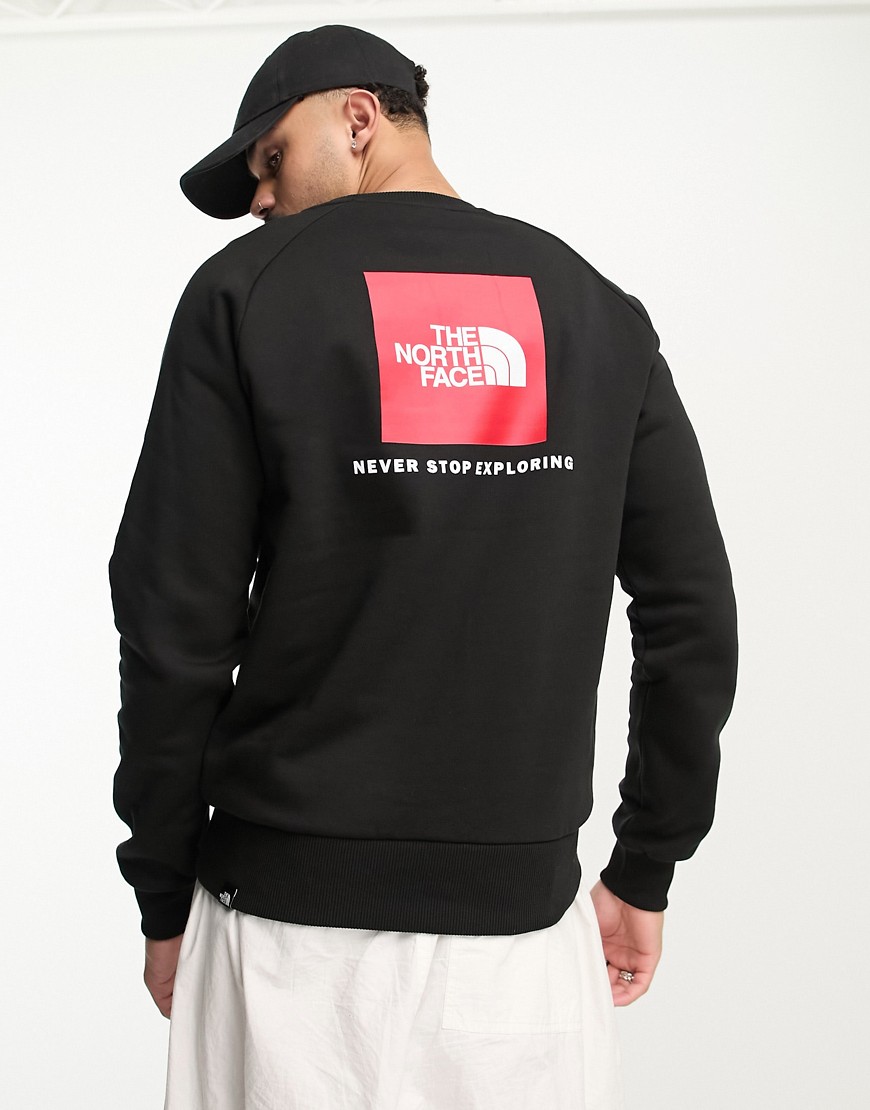 The North Face Redbox back print raglan sleeve fleece sweatshirt in black