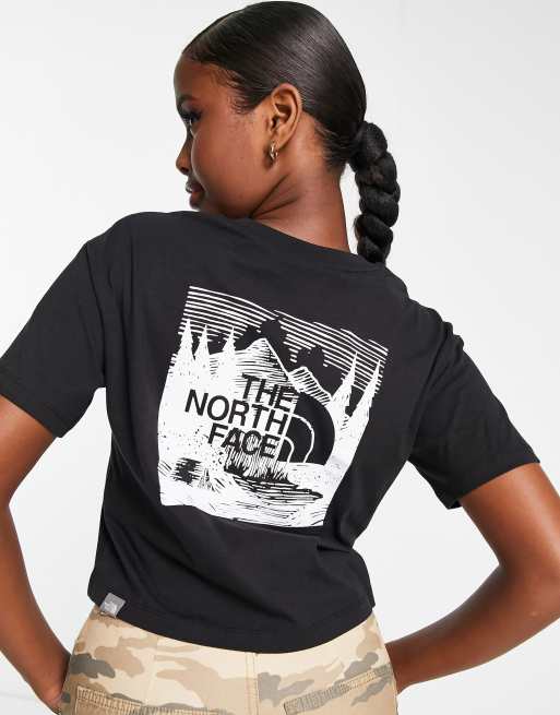The North Face Redbox Celebration back print cropped t-shirt in black Exclusive at ASOS