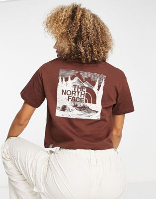 The North Face Redbox Celebration back print cropped t-shirt in brown Exclusive at ASOS