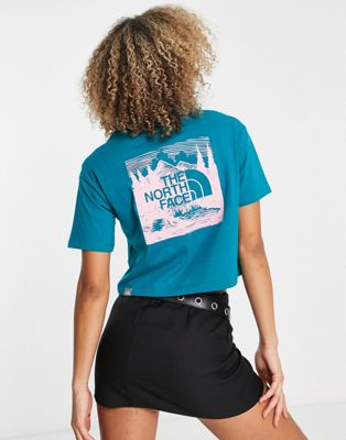 The North Face Redbox Celebration back print cropped t-shirt in teal Exclusive at ASOS