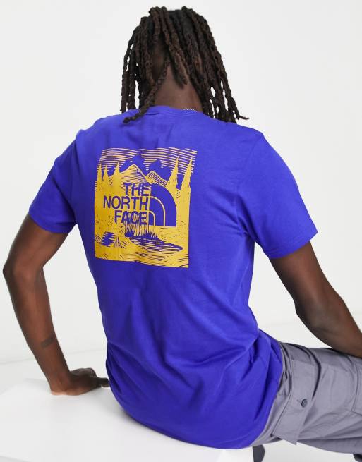 The North Face Redbox Celebration back print t-shirt in dark blue Exclsuive at ASOS