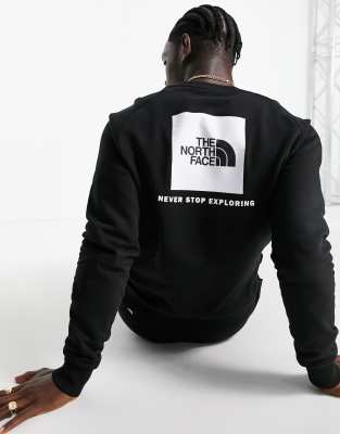 The North Face Redbox raglan sleeve back print fleece sweatshirt in black