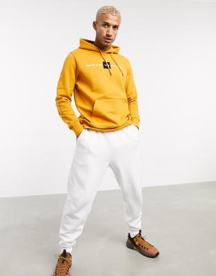 yellow north face sweater