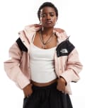 [The North Face] The North Face Reign On waterproof jacket in light pink exclusive to ASOS XS PINK