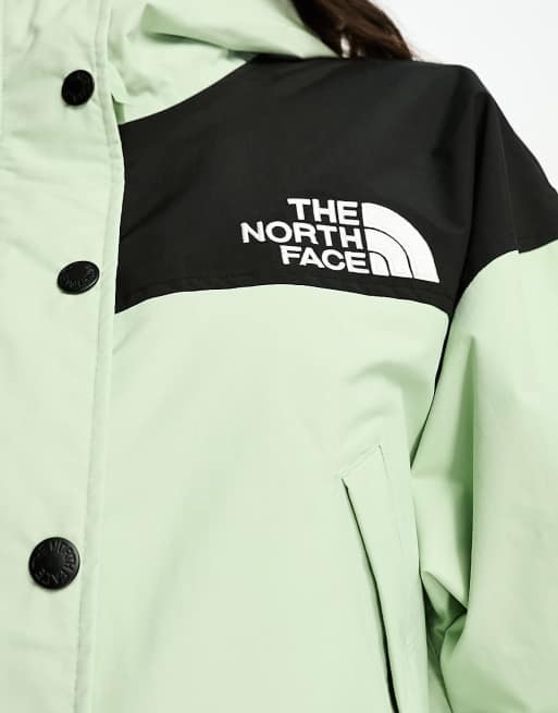 Green north face waterproof on sale jacket