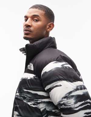 The North Face Retro Nuptse down puffer jacket in black and white print