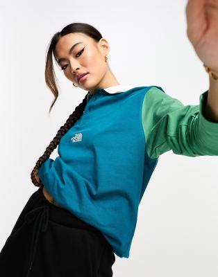 The North Face The North Face Rugby boyfriend fit heavyweight polo in blue and green Exclusive at ASOS