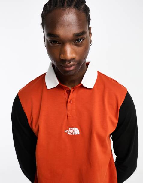 The North Face Rugby heavyweight polo in black and red Exclusive at ASOS