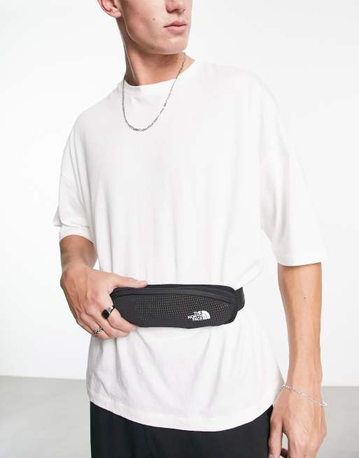 The North Face Running waist bag in black ASOS