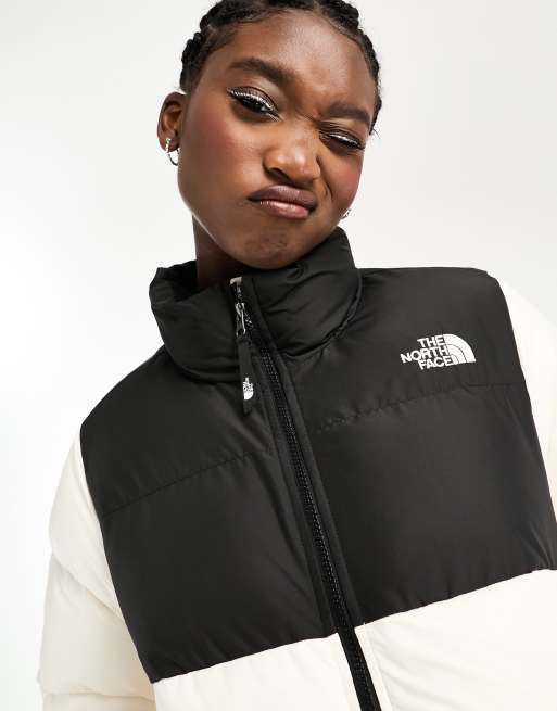 The North Face Saikuru cropped puffer jacket in cream and black Exclusive at ASOS