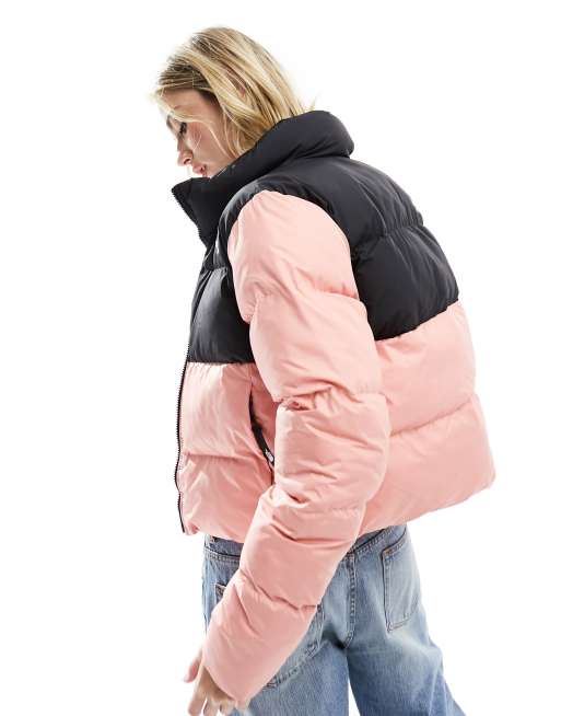 The North Face Saikuru cropped puffer jacket in pink and black