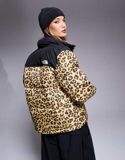 The North Face Saikuru logo puffer jacket in leopard print exclusive to ASOS