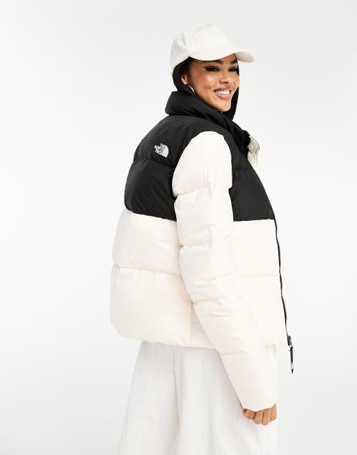 The North Face Saikuru puffer jacket in cream and black