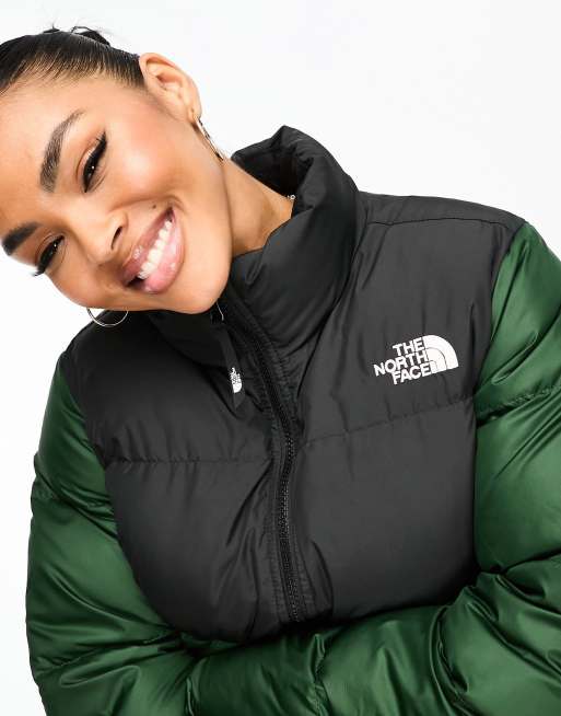 North face green on sale and black puffer