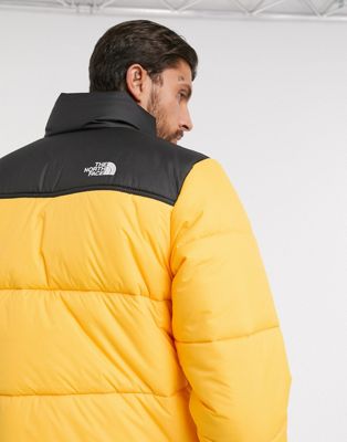 yellow north face vest