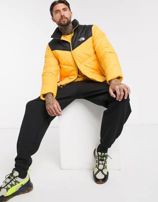 yellow north face puffer coat