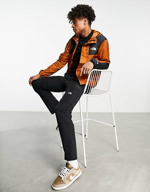 The North Face Seasonal Mountain water repellent jacket in brown and black  - Exclusive at ASOS