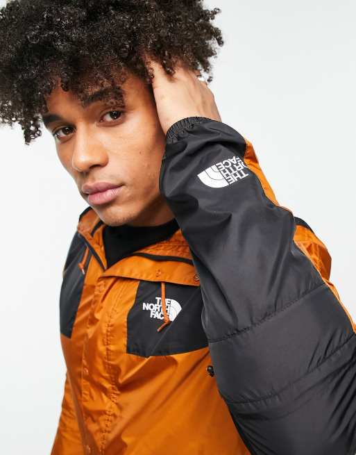 The North Face Seasonal Mountain water repellent jacket in brown