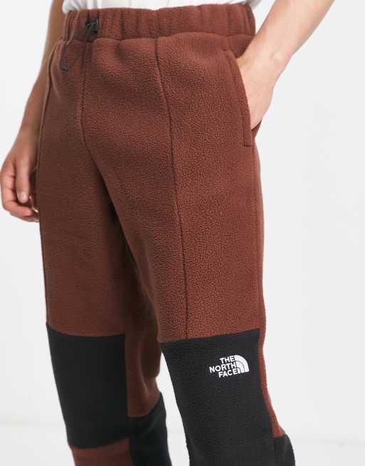 The North Face Shispare sherpa fleece joggers in cream Exclusive at ASOS