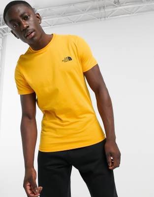 yellow north face top