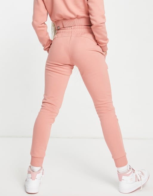 The North Face Skin Tight joggers in pink Exclusive at ASOS