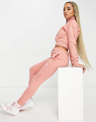 The North Face Skin Tight track pants in pink Exclusive to ASOS ASOS