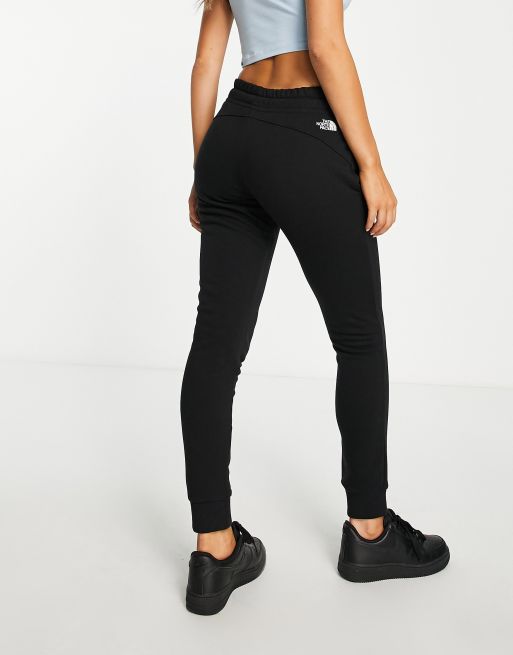 The North Face skinny joggers in black Exclusive at ASOS