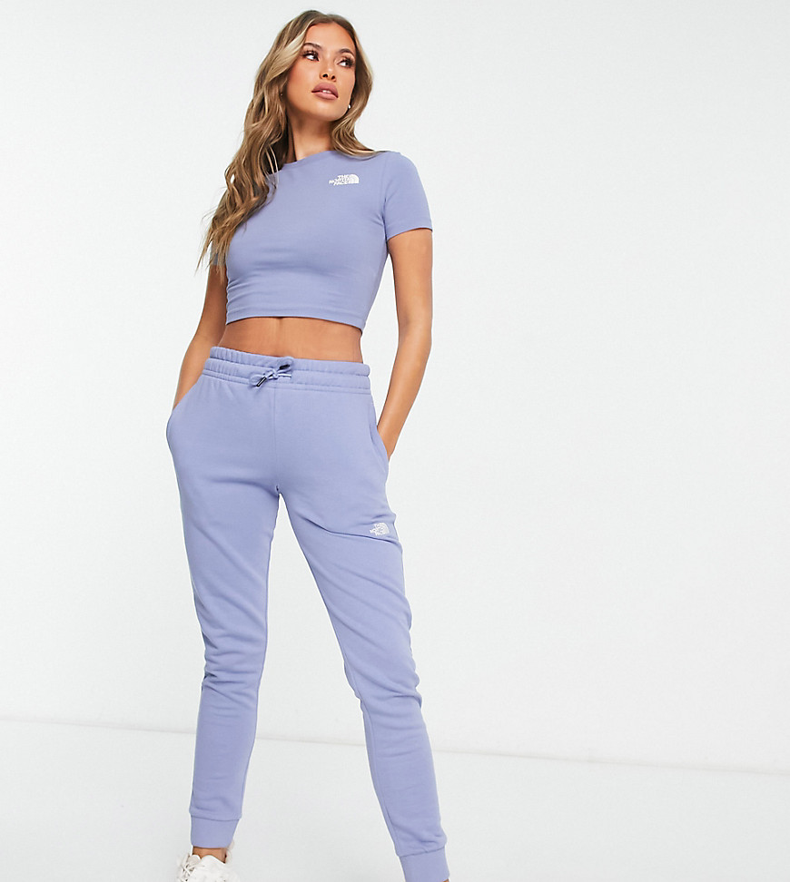 The North Face skinny joggers in blue Exclusive at ASOS